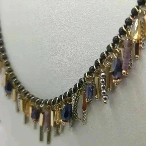Premier Jewelry necklace with dark beads and gold, purple and white dangles. - Picture 3 of 4